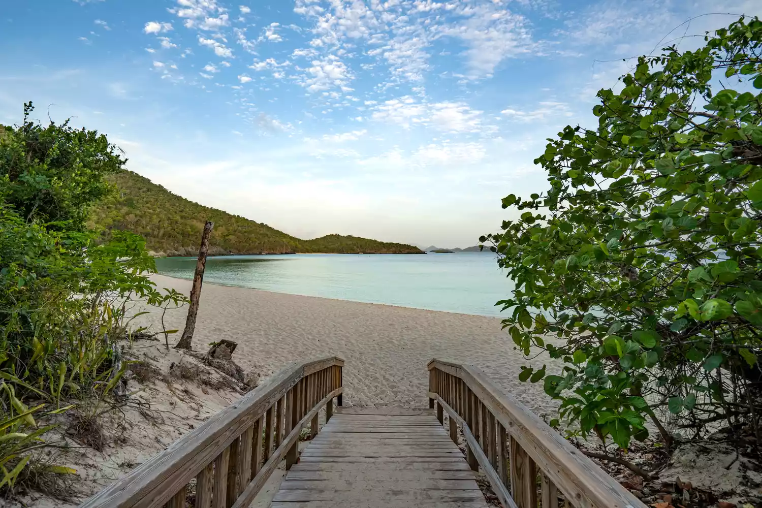 Vibrant sunrise over famous Trunk Bay on the tropical Caribbean island of St. John in the US Virgin Islands