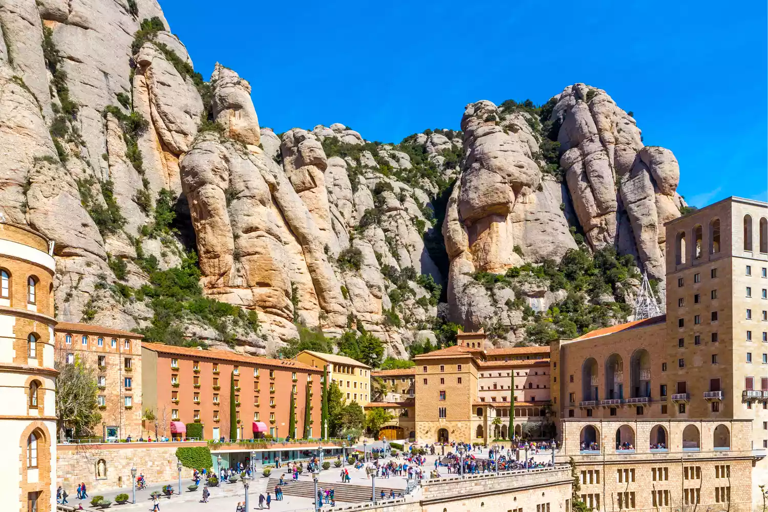 Santa Maria de Montserrat abbey in Monistrol in beautiful summer day, Catalonia, Spain