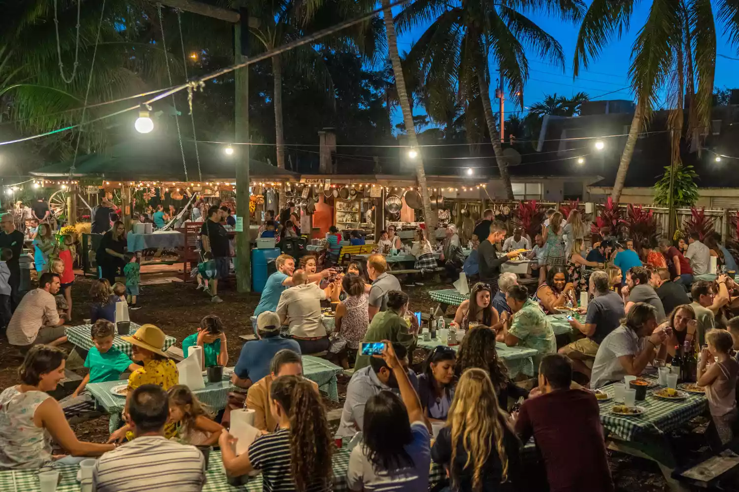 Large crowds of people dining at Regina's Farm