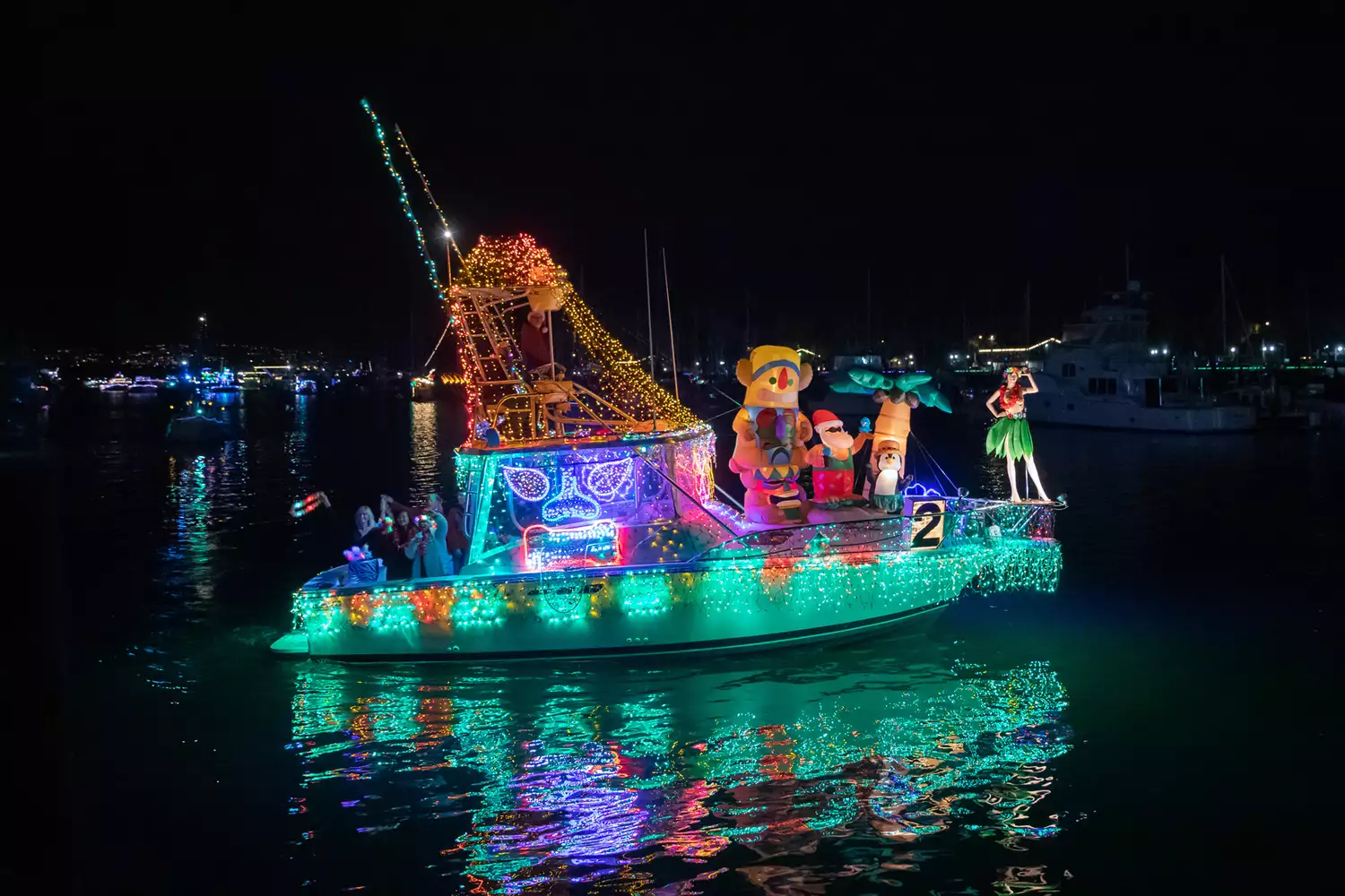 Holiday lights decorating a boat in the Dana Point Harbor light show