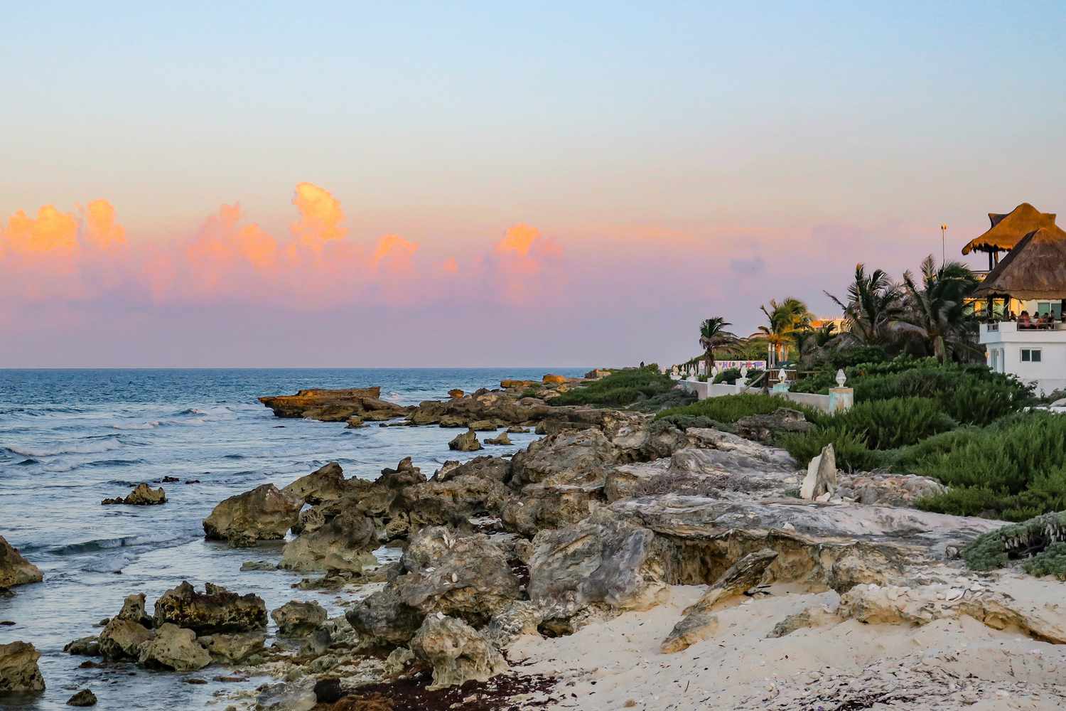 Sunset on a rocky coastline of Isla Mujeres