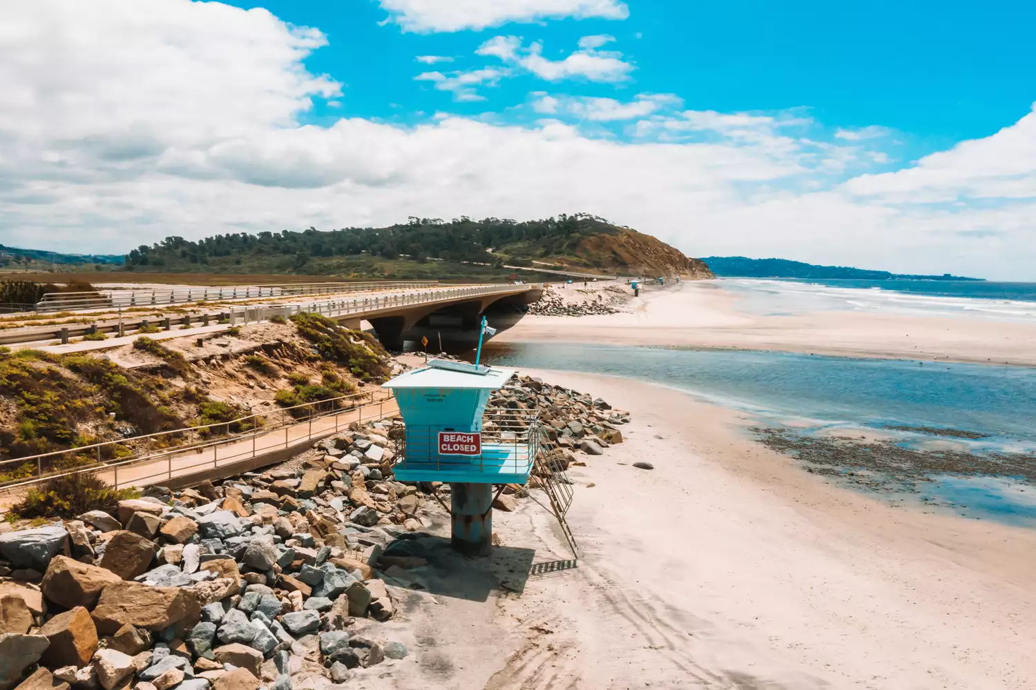 Empty beach with lifeguard stand in San Diego