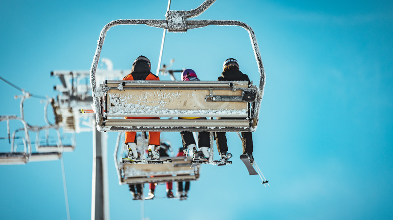Skiers on a ski lift